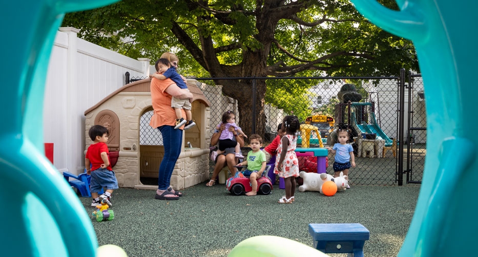 Little kids on the playground at Mother Hubbard Preschool
